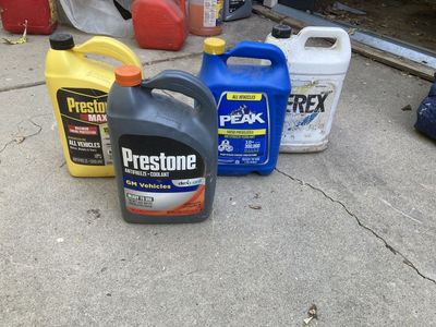 Free: Assorted Antifreeze and Coolant Jugs - Prestone, PEAK, Zerex