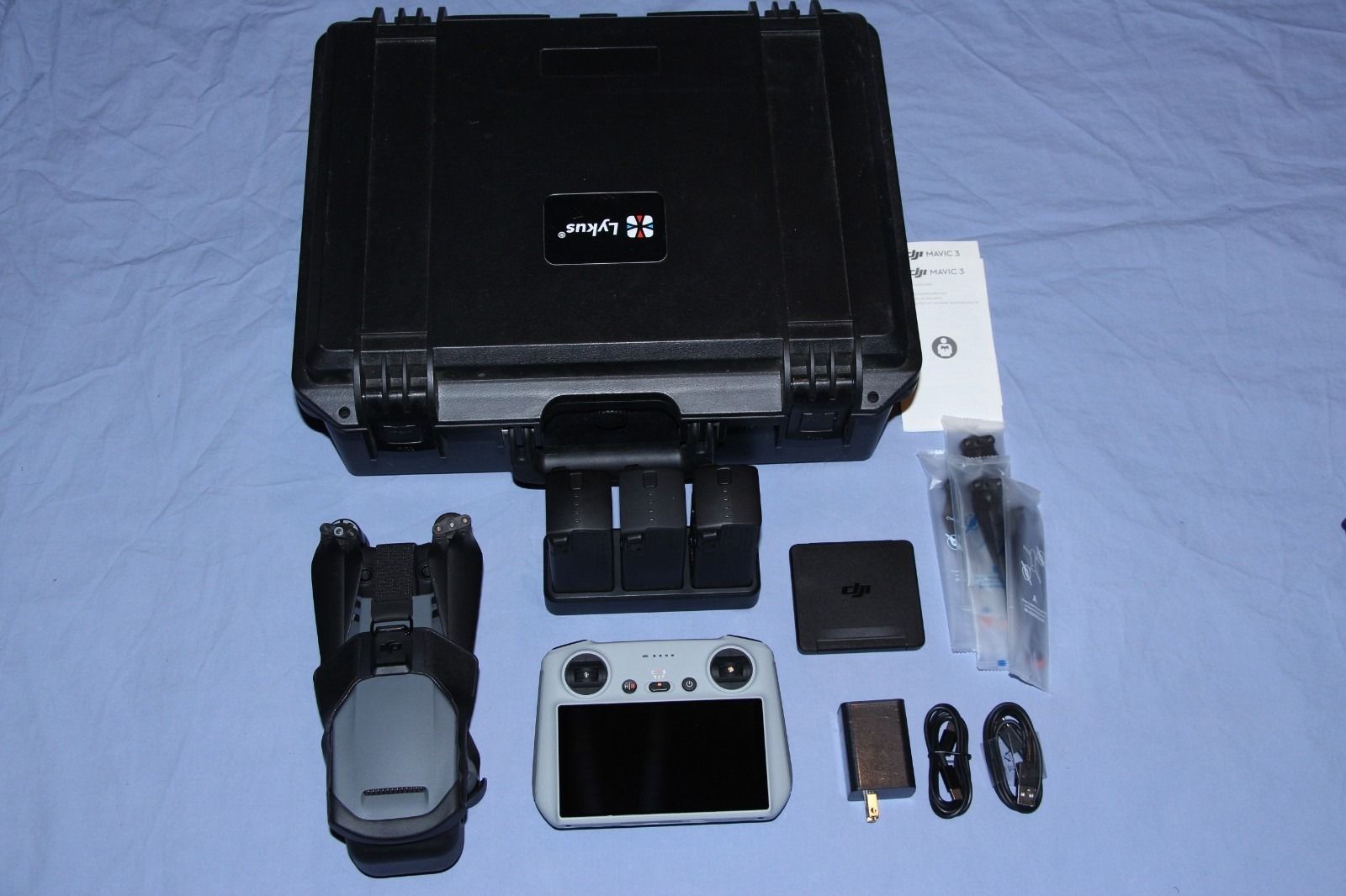 DJI Mavic 3 Quadcopter Drone with Fly More Combo and DJI RC - Unbound Remote Controller