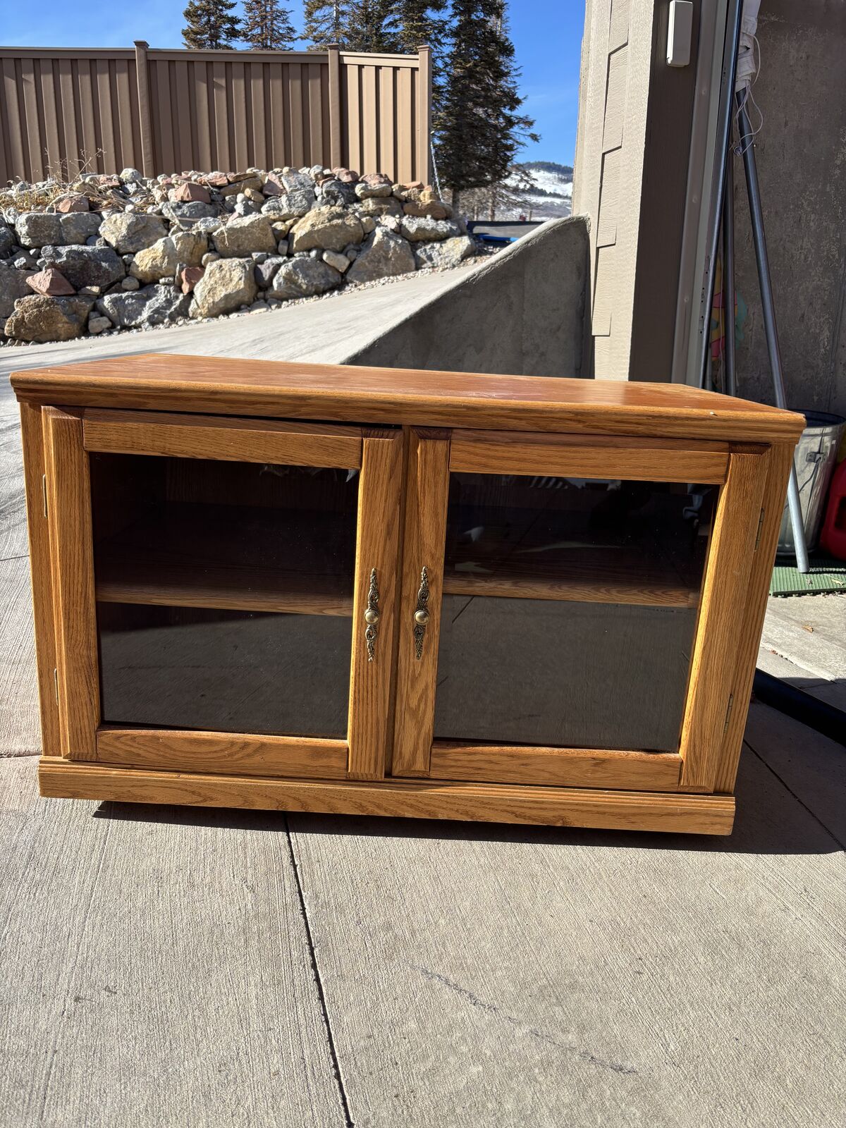 Tv stand/oak storage unit with glass doors