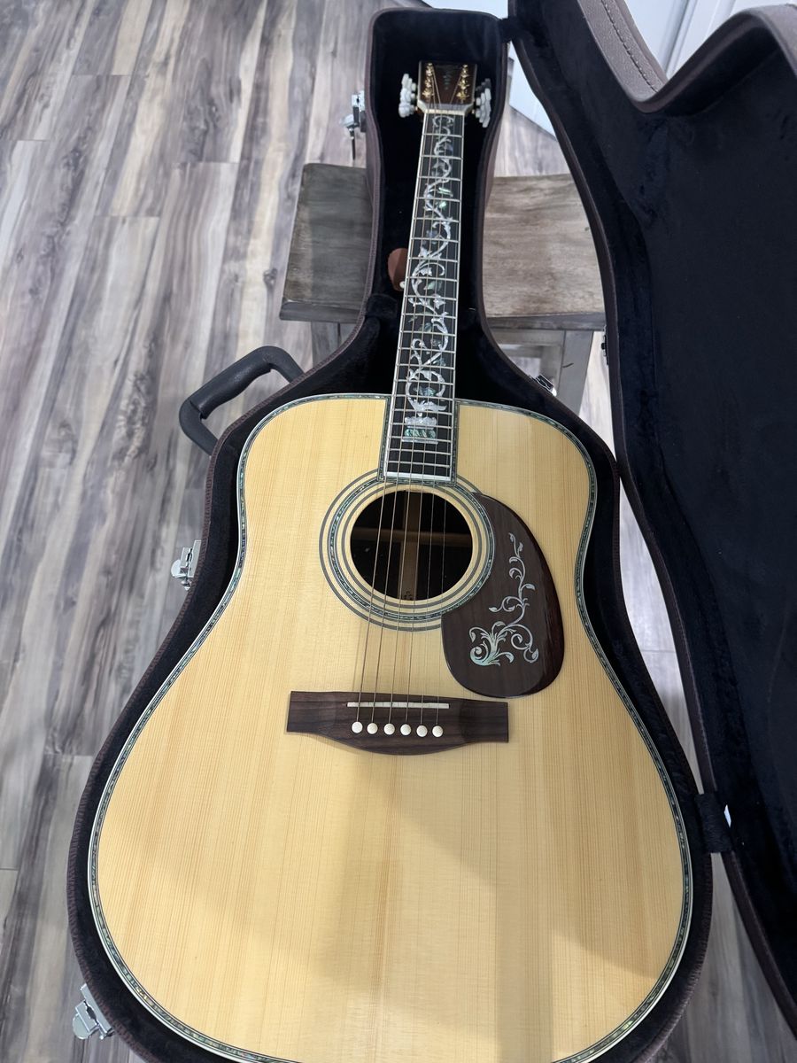 Custom D45 Acoustic Electric Guitar with Intricate Inlays. Solid spruce top and solid mahogany  side and Back