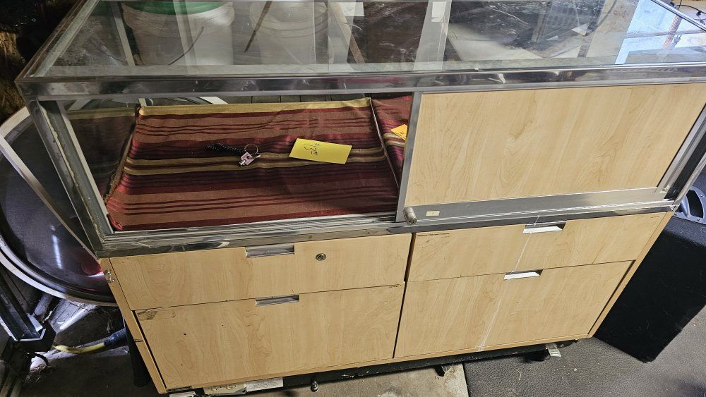 Glass Display Case with Storage Drawers and Light Wood Finish
