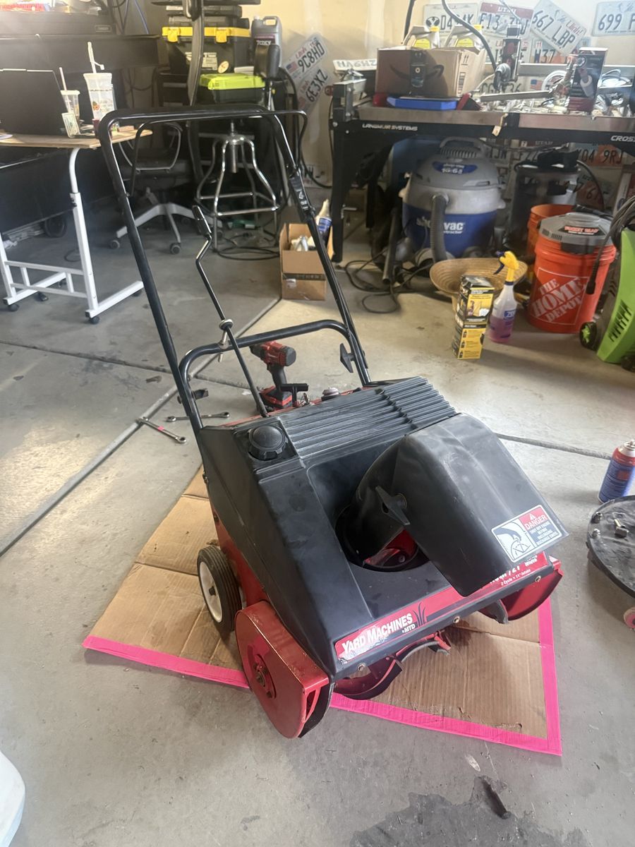 Running Snow Blower