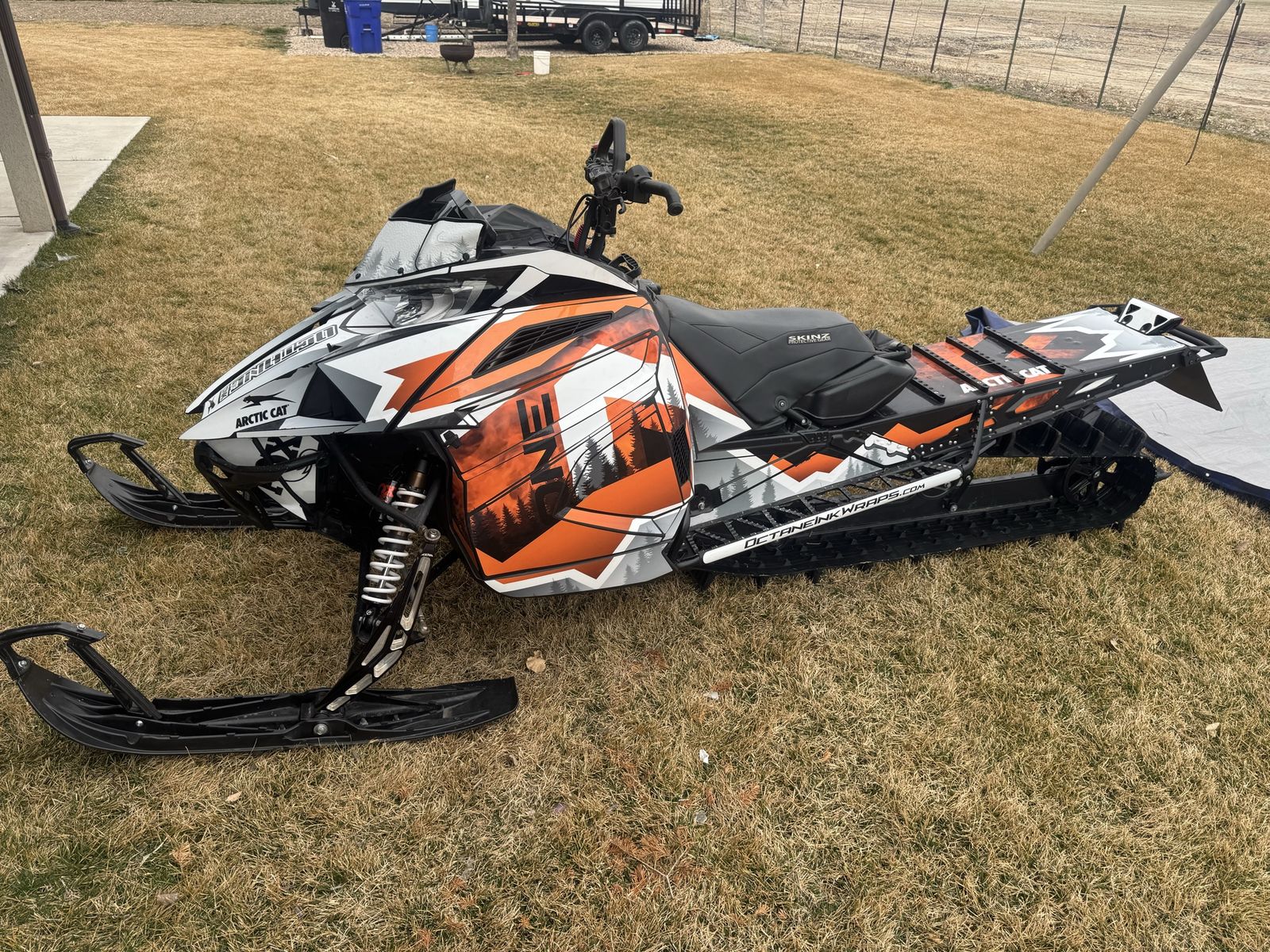 Supercharged Arctic Cat M8000 Snowmobile with Custom Octane Ink Wrap 