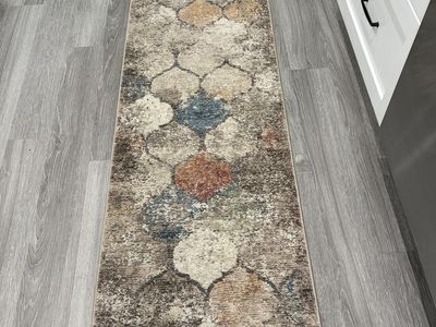 long rug 7 feet 4 inches long and 2 feet wide