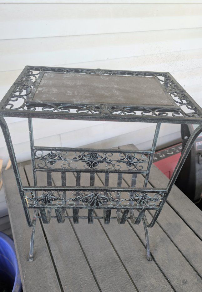 Vintage wrought iron side table with magazine holder located in Roy venmo or cash fcfs 
