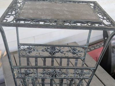 Vintage wrought iron side table with magazine holder located in Roy venmo or cash fcfs