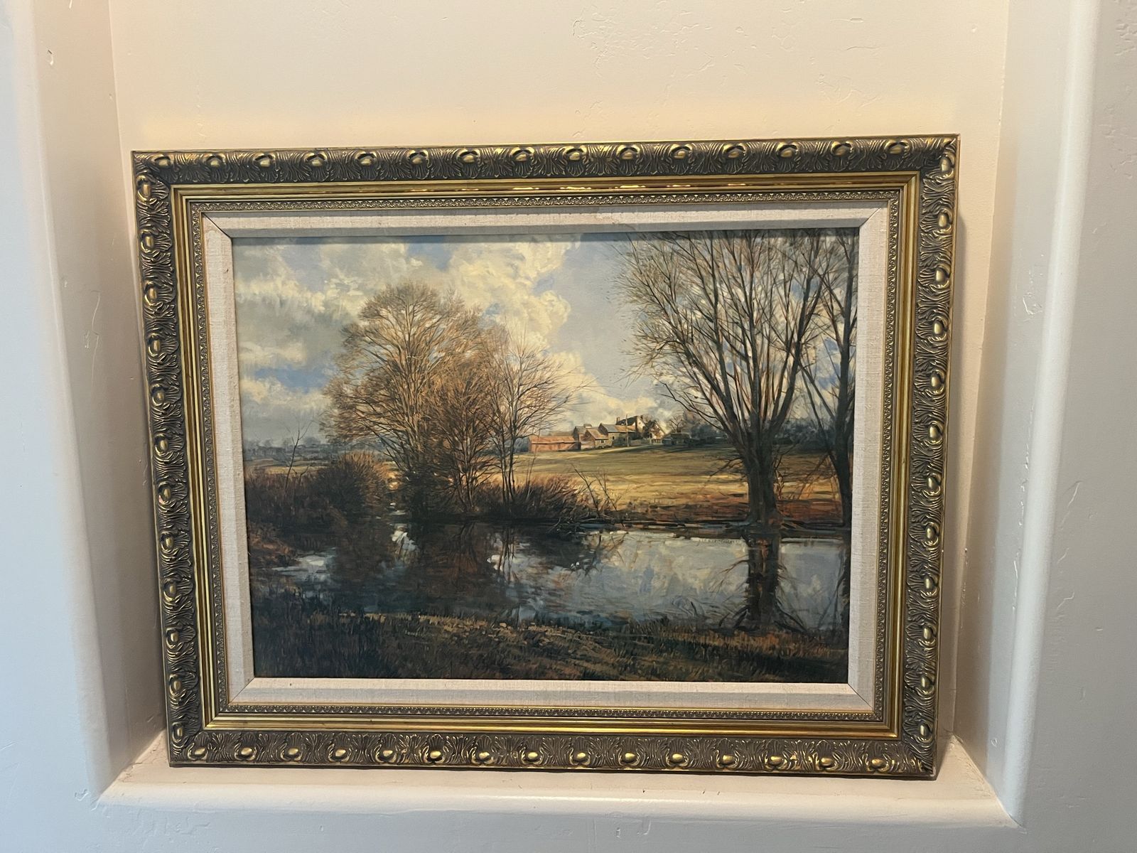 Beautiful scenic country, river painting in a beautiful bronze/gold frame 31" x 25". The painting is 26" x 19"