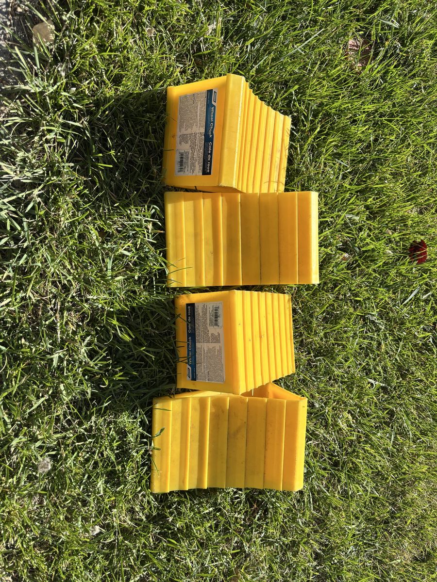 Camco Yellow RV Wheel Chocks (Set of 4) - Durable Plastic Blocks for Trailer & Camper Safety