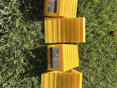 Camco Yellow RV Wheel Chocks (Set of 4) - Durable Plastic Blocks for Trailer & Camper Safety