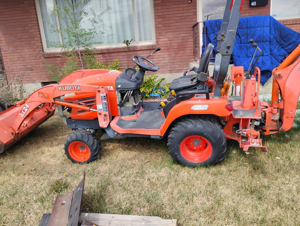 Kubota 2008 BX24D with backhoe and attachments