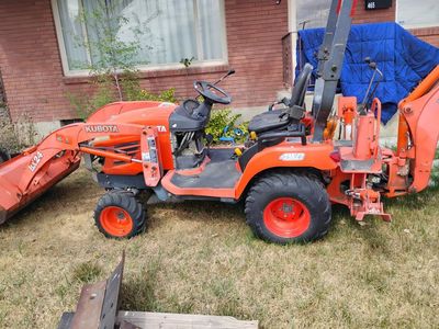 Kubota 2008 BX24D with backhoe and attachments
