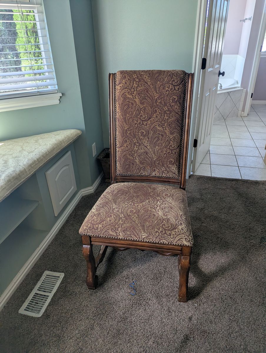 Wooden cushioned chair