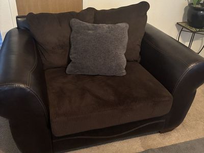 Brown love seat couch