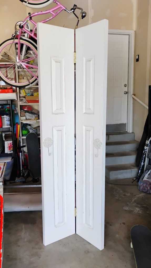 White 2-Panel Interior Bi-Fold Closet Door with Brass Hinges & Decorative Hooks