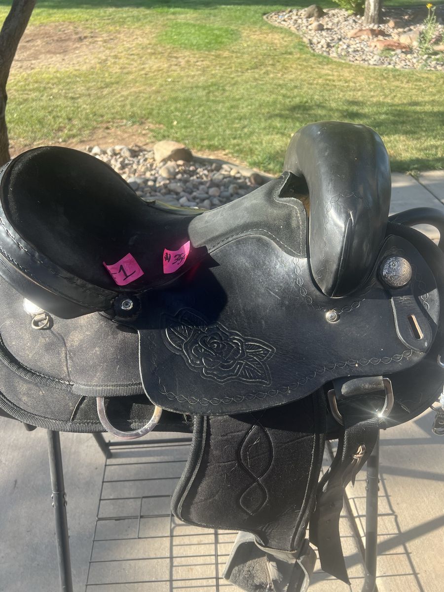 For sale, a black 16-inch endurance saddle in good used condition.