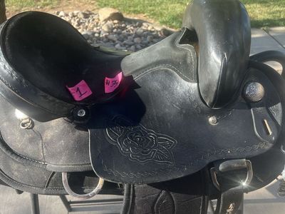 For sale, a black 16-inch endurance saddle in good used condition.