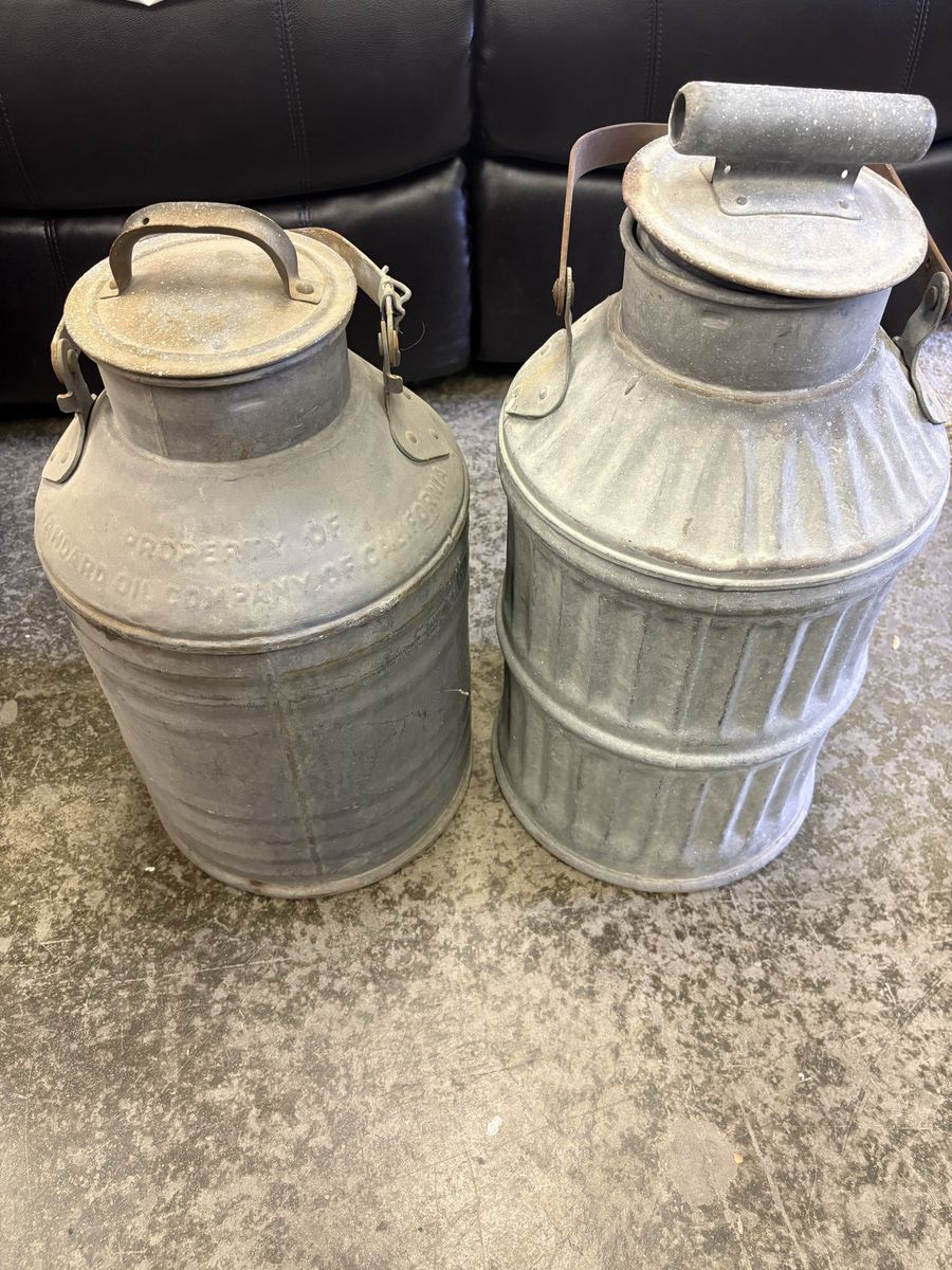 Vintage bulk oil cans