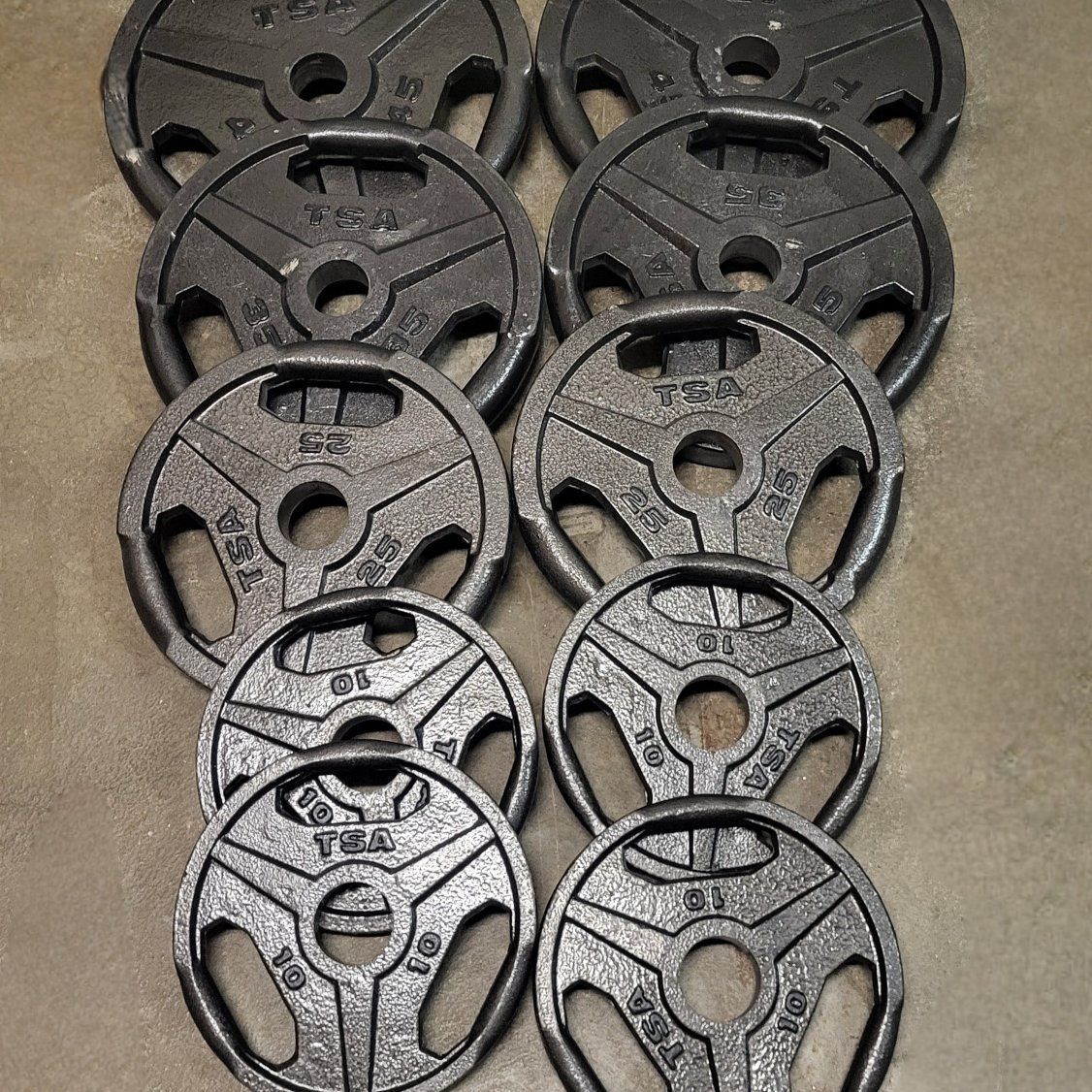 250 pounds of Olympic weights