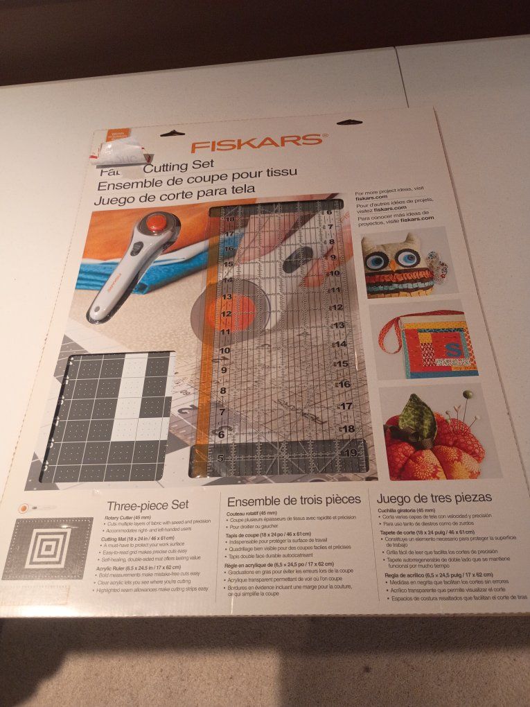 Fiskars 3-Piece Fabric Cutting Set - 45mm Rotary Cutter, 18x24 Mat, 6.5x24.5 Ruler