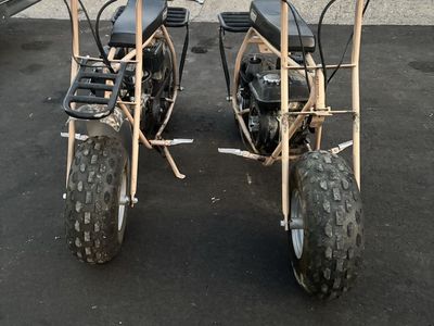 Pair of Coleman Powersports CT200U-C Camo Mini Bikes