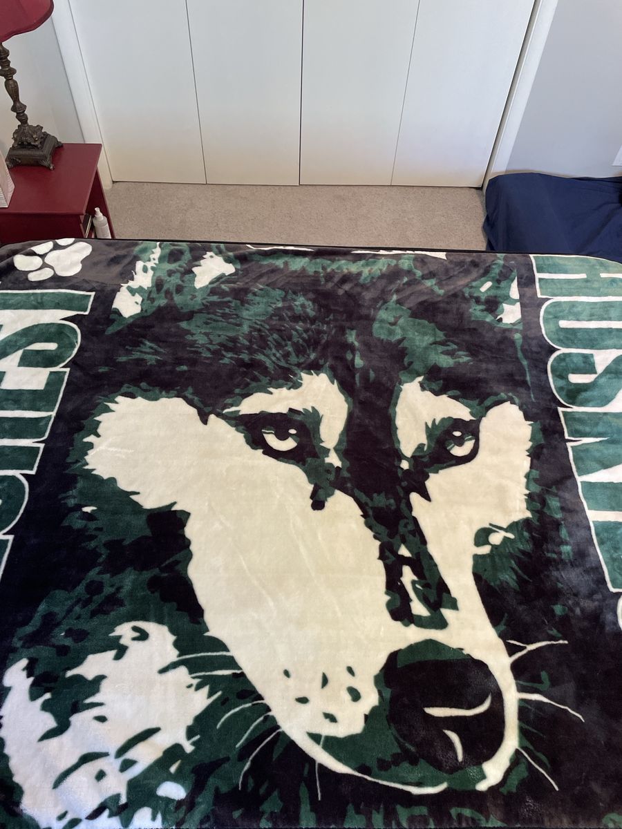 Hillcrest Huskies Green and Black Plush Fleece Throw Blanket