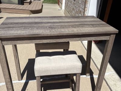 Tall bar table with stools