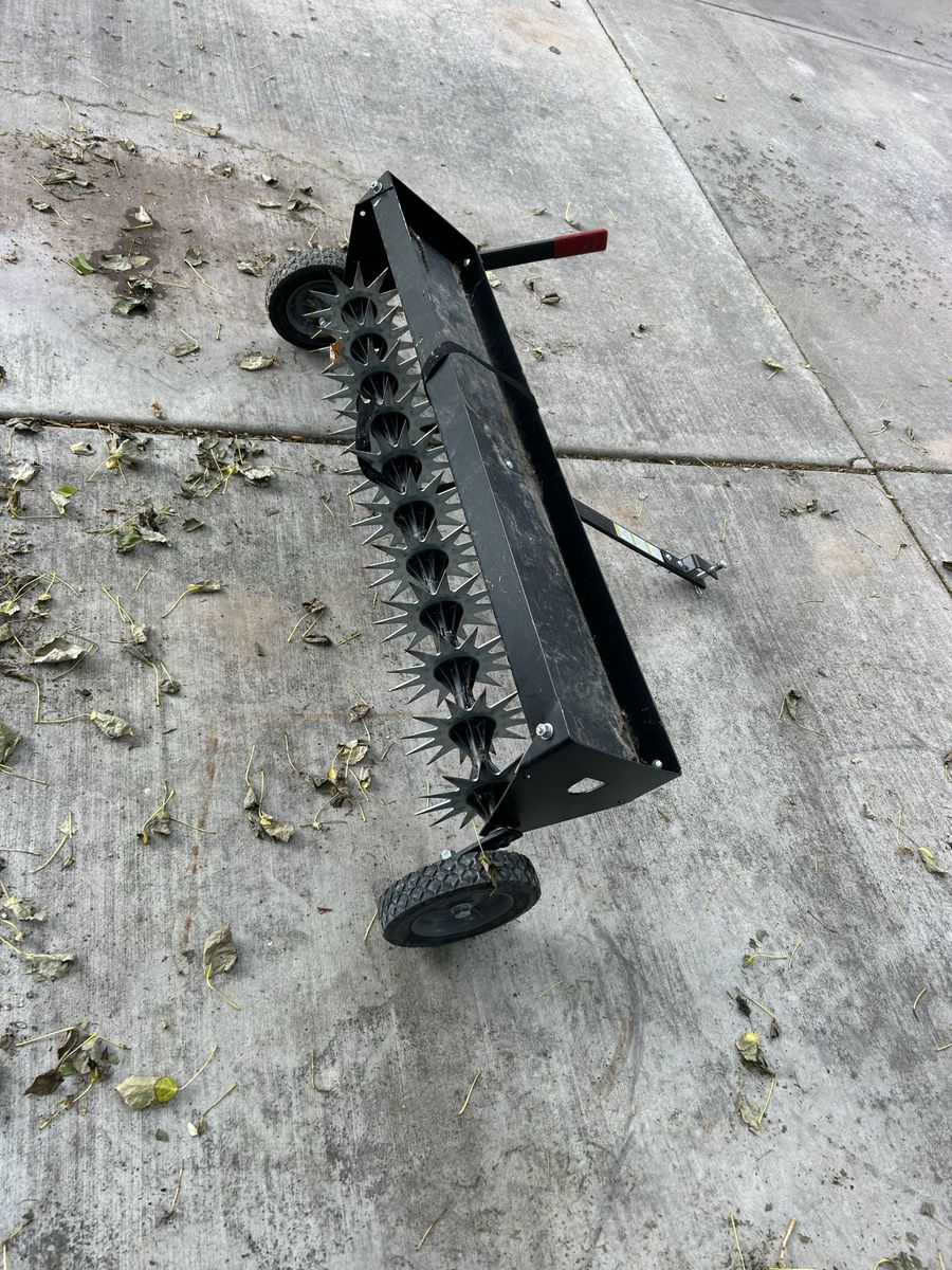 Aerator , pull behind riding lawnmower