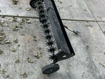 Aerator , pull behind riding lawnmower