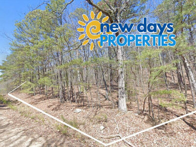 0.25 Acres of Mountainous Treed Land for Sale in Fairfield Bay, Arkansas