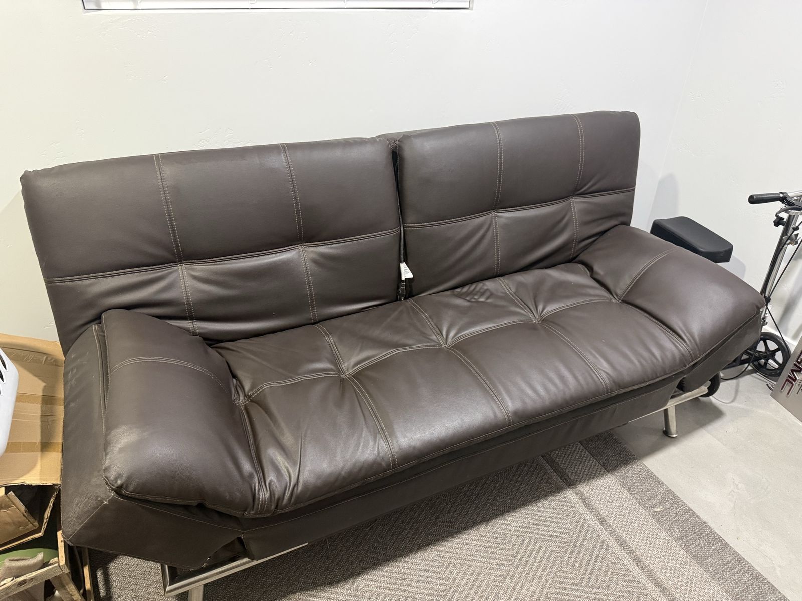 Brown Faux Leather Futon Sofa Bed with Tufted Cushions