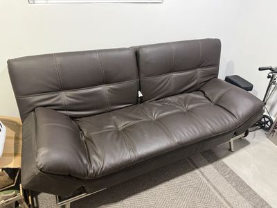 Brown Faux Leather Futon Sofa Bed with Tufted Cushions