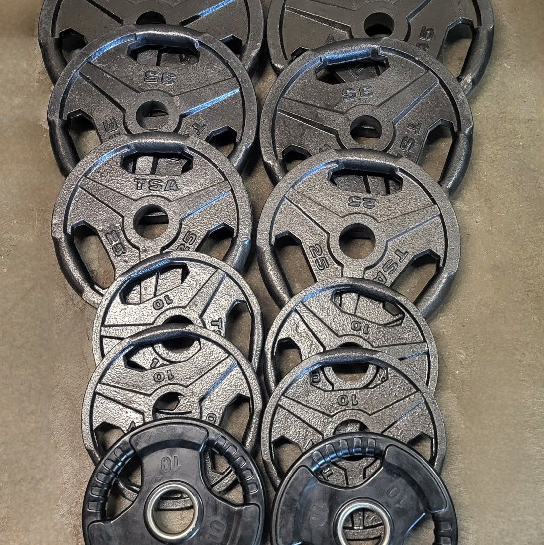 270 pounds of Olympic weights