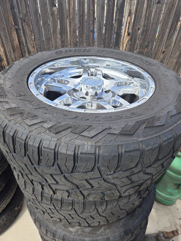 Toyo Open Country A/T 275/65R18 Tires with Chrome 18 inch Rims Set of 4- 6x139.7 Toyota 