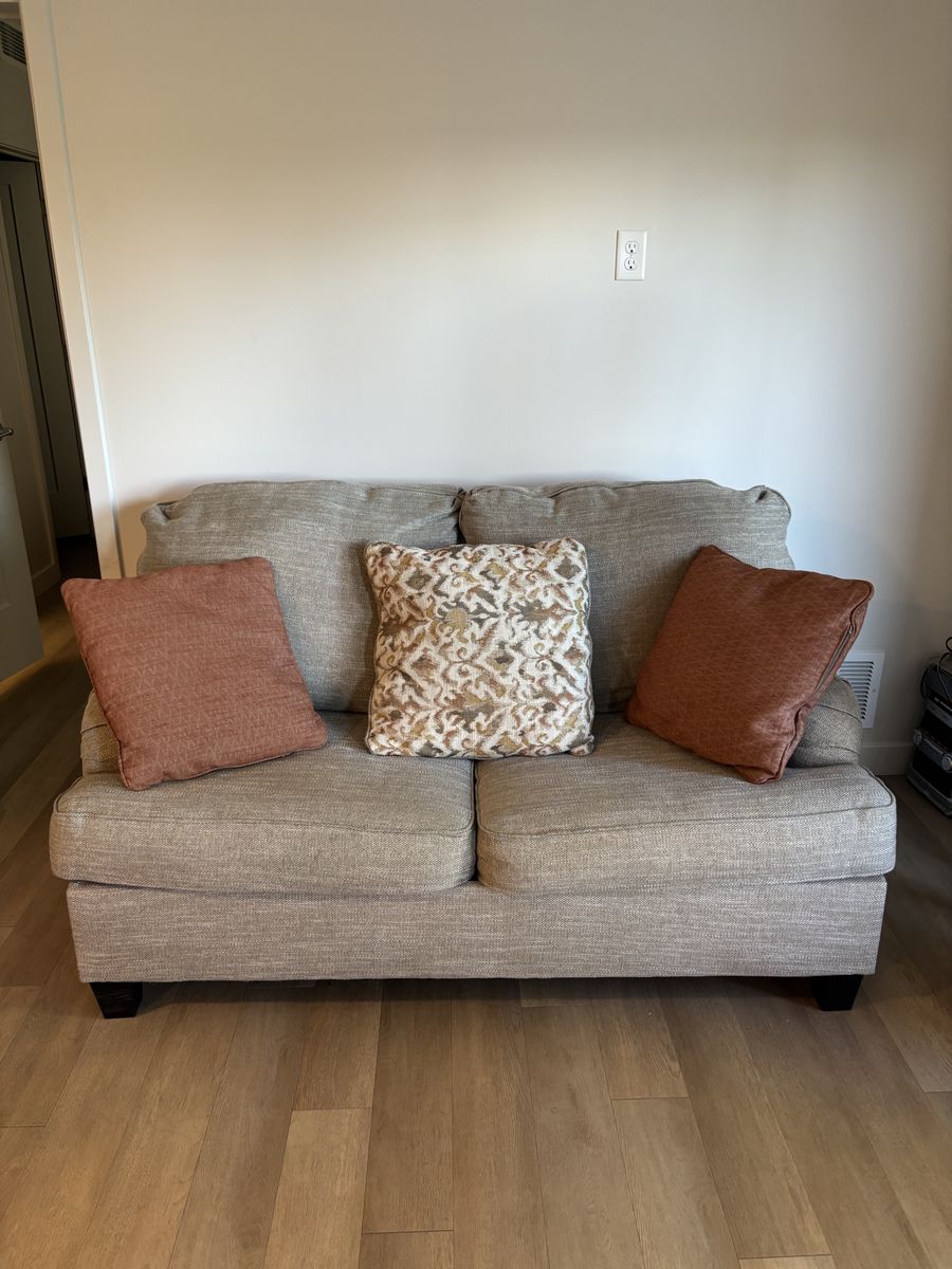 Ashley Furniture Loveseat (decorative pillows included)