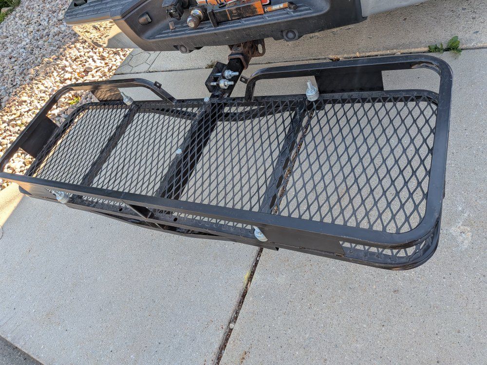 Foldable hitch cargo carrier.