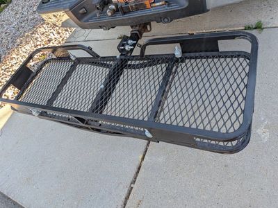 Foldable hitch cargo carrier.