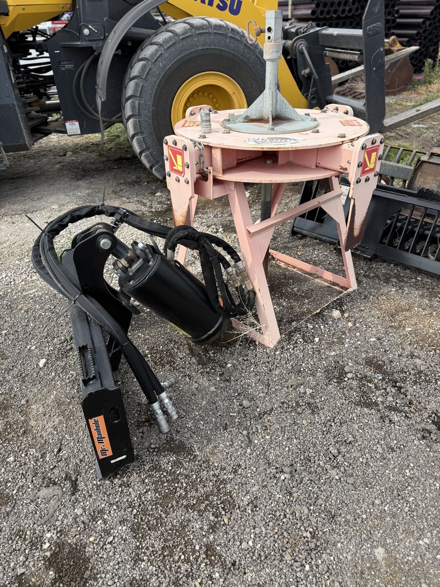 Skid steer Mr. manhole man hole cutting auger