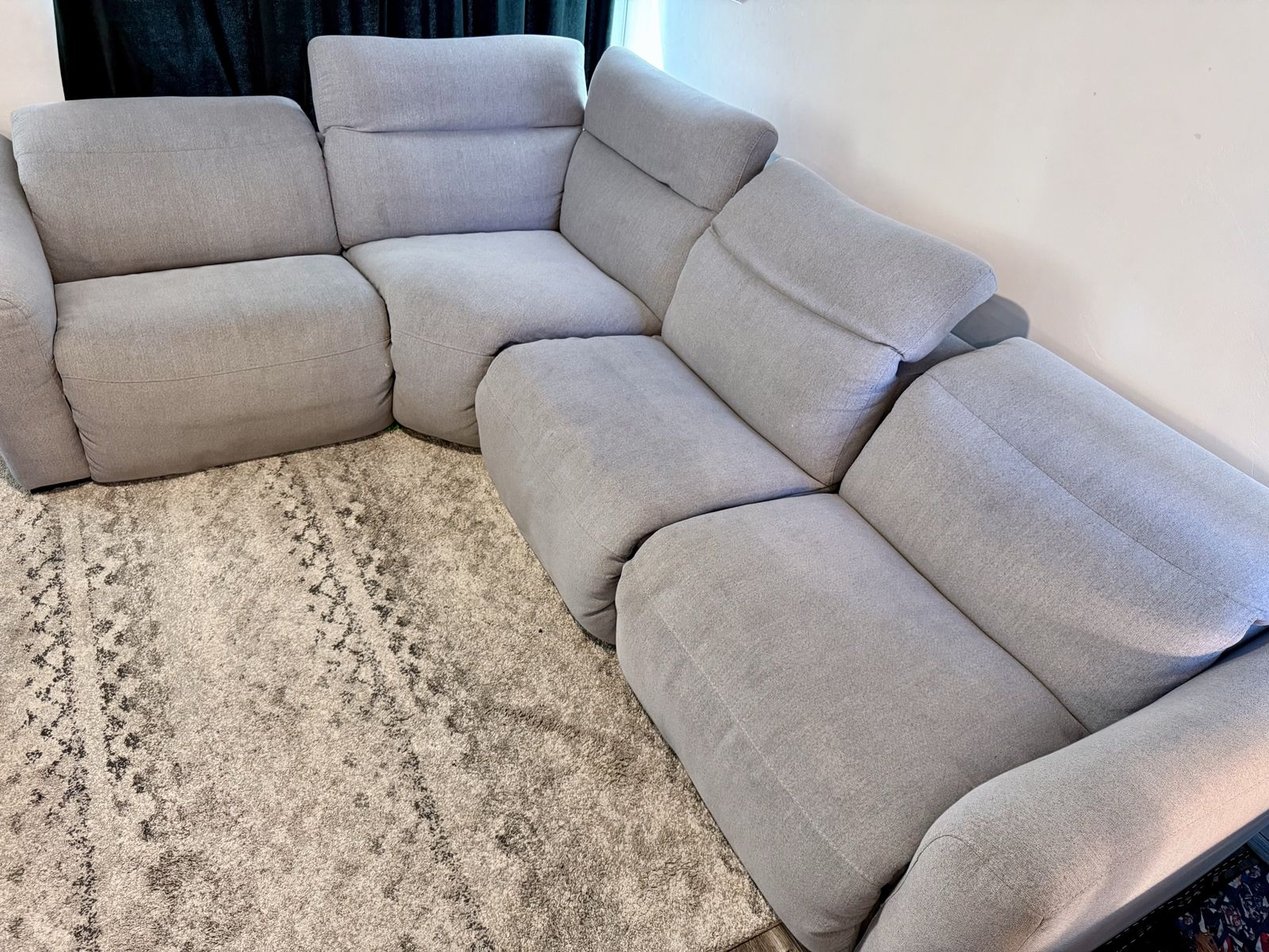 L shaped Couch with 3 recliners and extra section not pictured