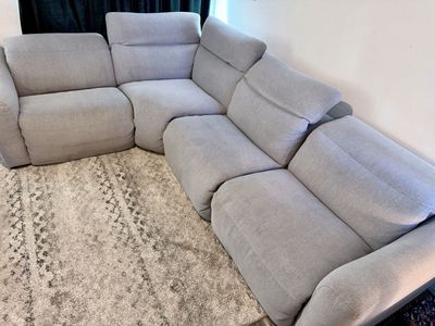 L shaped Couch with 3 recliners and extra section not pictured
