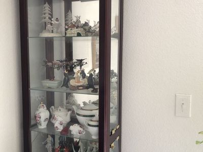 Tall Mahogany Finish Curio Display Cabinet with Glass Shelves and Built-In Light