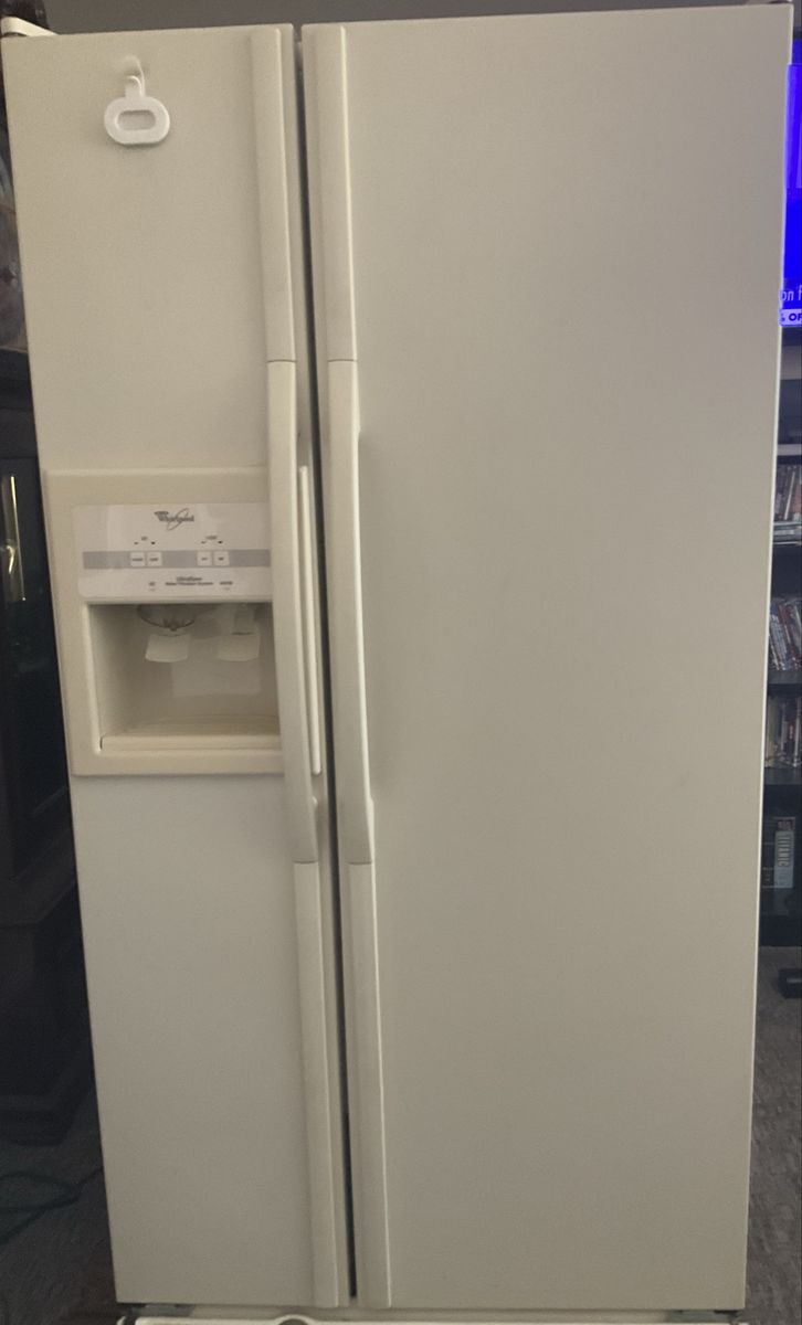 Free Whirlpool Refrigerator.