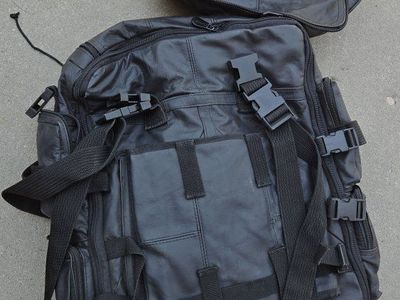 Motor Cycle Black Leather Hangs on on seat or back - Durable & Versatile Travel Gear