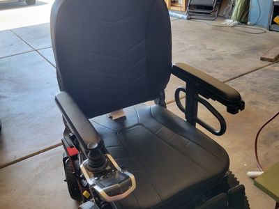 Quantum Rehab Power Wheelchair with Harmar Vehicle Lift