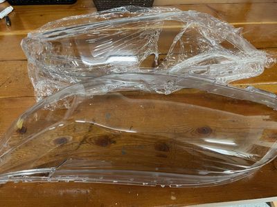 Headlight covers (left/right) for 2014 Toyota Sienna, new (OEM) $50