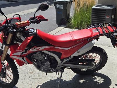Honda CRF250L Dual Sport Motorcycle - Red/White