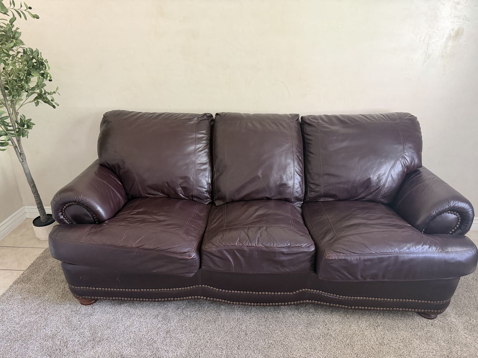 Brown leather couch with pull out bed