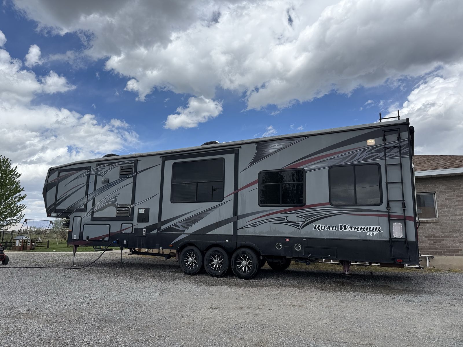 Heartland 390RW Road Warrior RV Toy Hauler Travel Trailer - 2014, 18000 lbs GVWR, Cummins Onan Gen