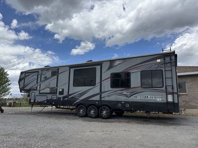Heartland 390RW Road Warrior RV Toy Hauler Travel Trailer - 2014, 18000 lbs GVWR, Cummins Onan Gen