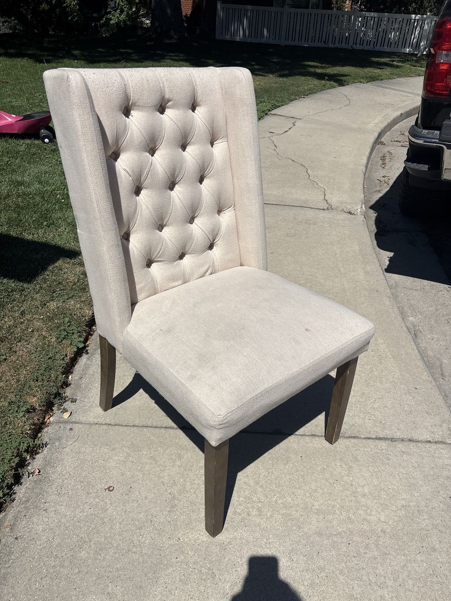 Elegant Beige Tufted Upholstered Dining Chair with Dark Wood Legs