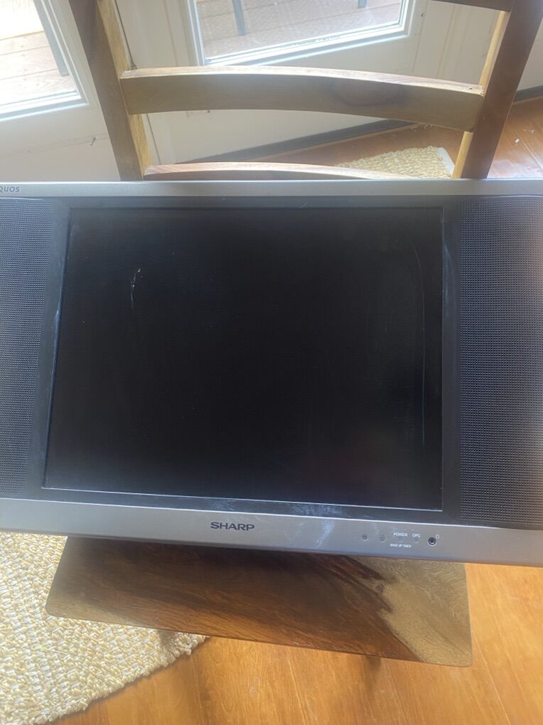 Sharp Aquos tv with mounting bracket 15” x 12